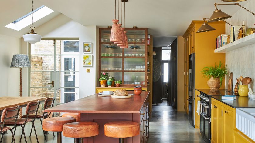 yellow and red kitchen with side return extension dining area