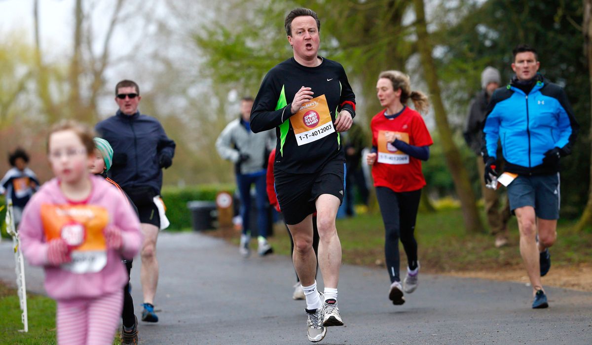 OXFORD, ENGLAND - MARCH 23: Britain's Prime Minister David Cameron takes part in the Sport Relief Mile run for charity on March 23, 2014 in Oxford, England. (Photo by Eddie Keogh - WPA Pool/G