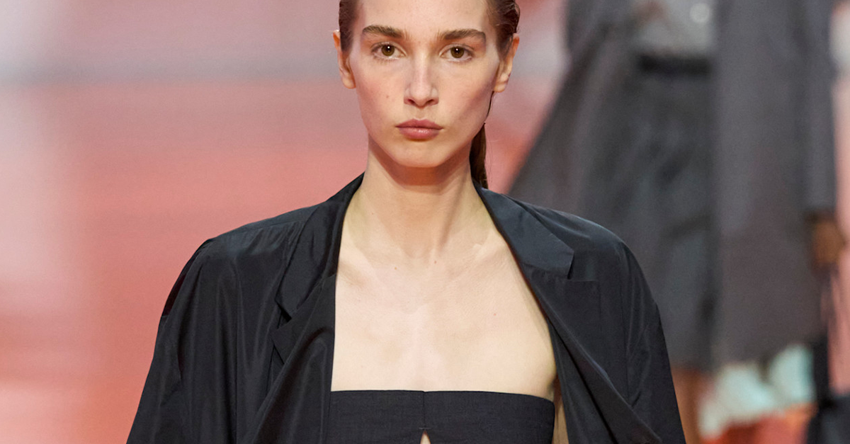 Photo of a model wearing one of the best bandeau bras from the Prada Spring Summer 2026 runway show.