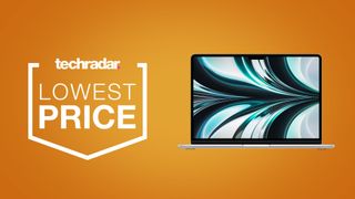 Apple MacBook Air M2 on an orange background next to TechRadar deals lowest price badge