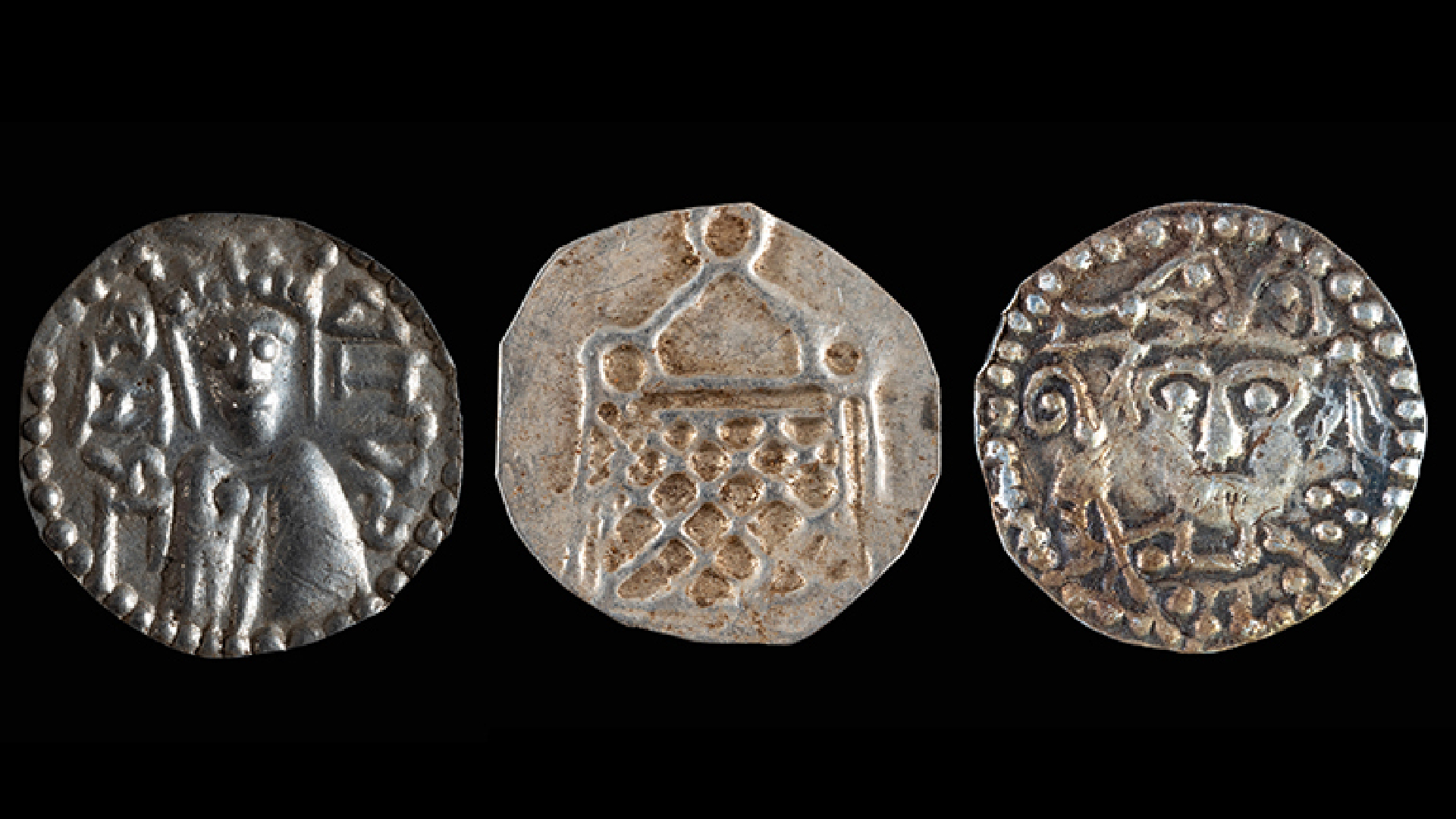 a row of three silver coins