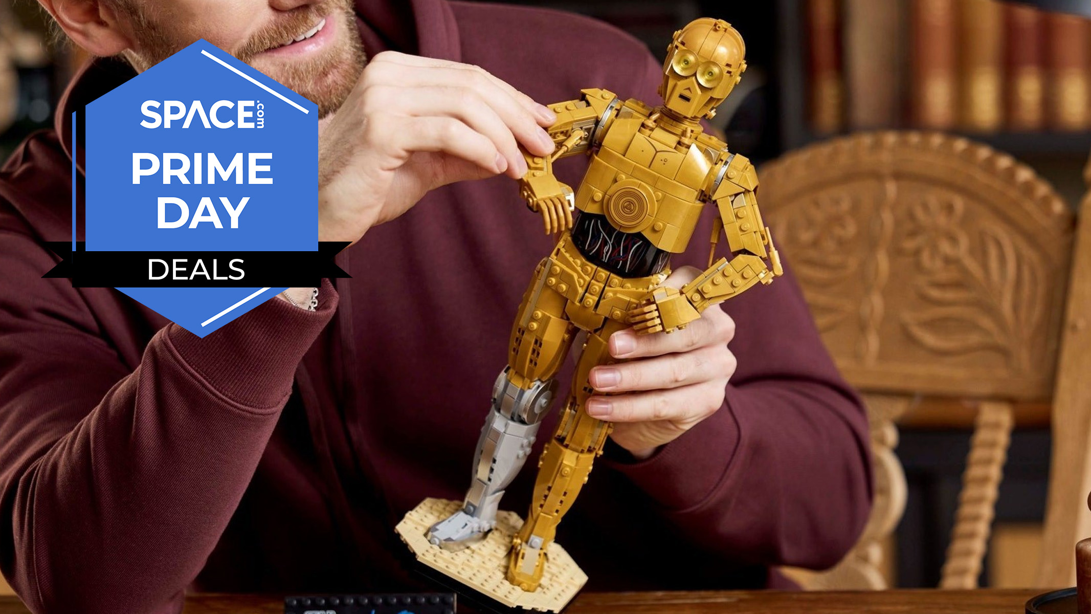 A person building a LEGO Star Wars C-3PO Buildable Droid Figure figure. 