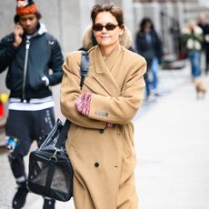 Katie Holmes wearing a camel coat in NYC