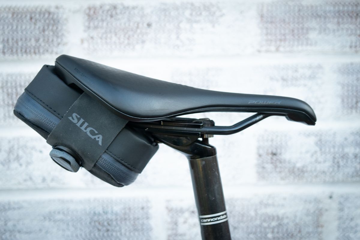 Silca Mattone seat pack in black attached to saddle rails using Boa closure system