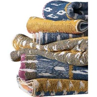 stack of colourful cotton bath towels