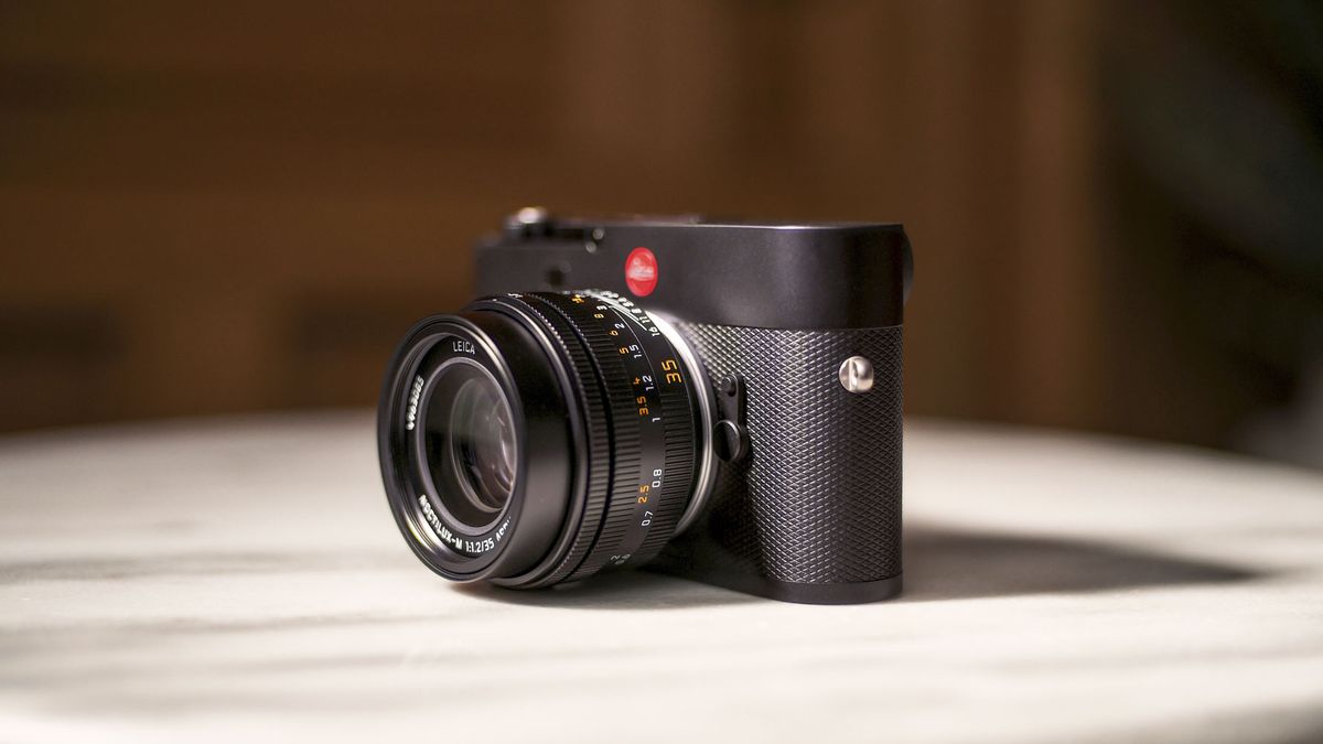 Leica Noctilux-M 35 f/1.2 ASPH lens attached to a Leica camera on a marble table