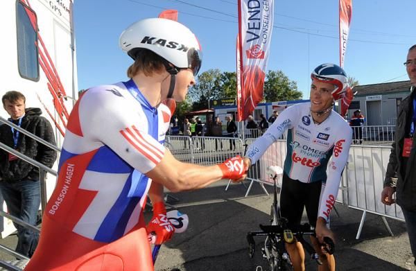 Edvald Boasson Hagen, left, and Philippe Gilbert shake hands prior to their starts.