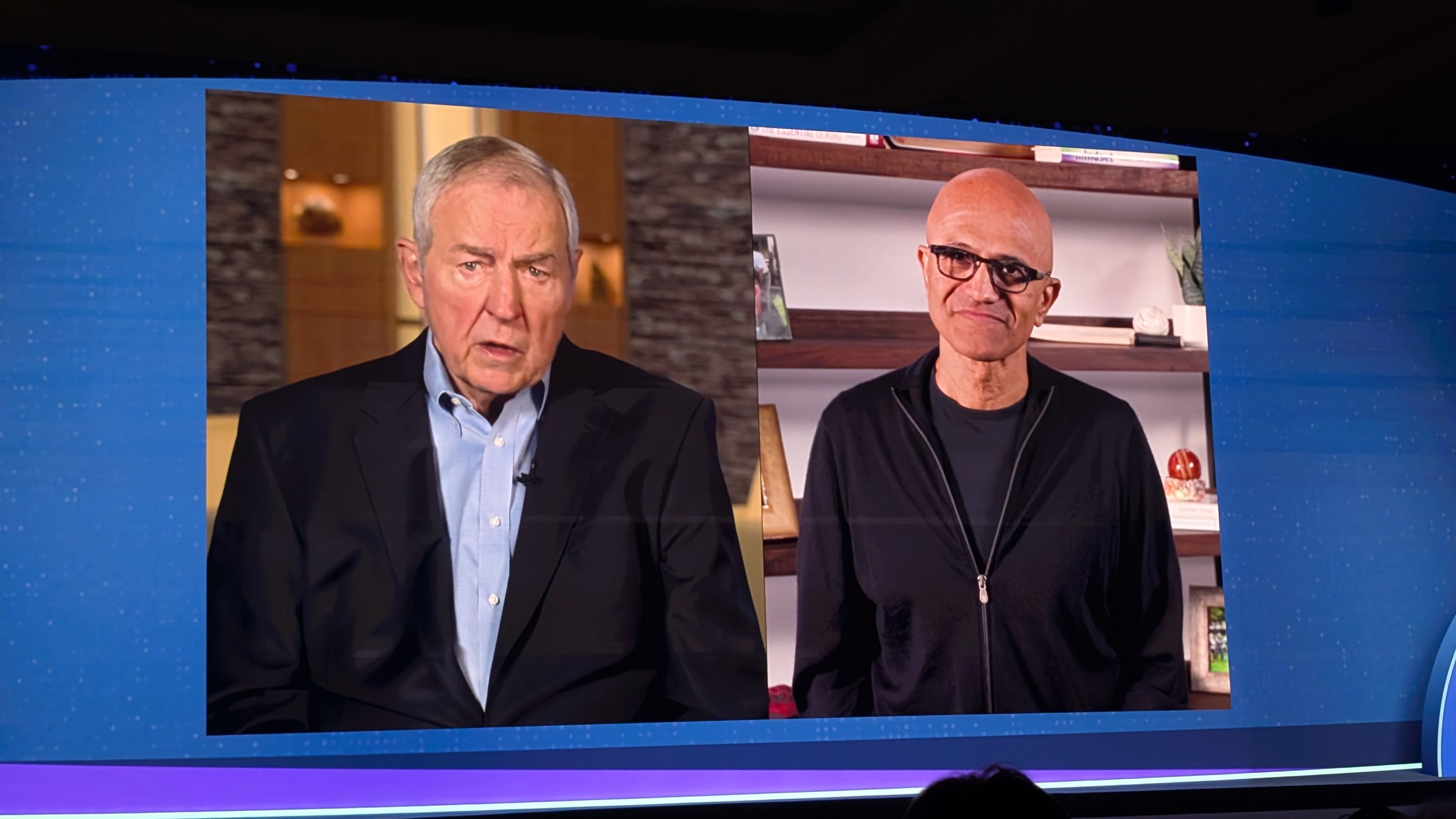Jim Goodnight, Co-Founder & CEO, on a screen next to Satya Nadella, chairman and CEO at Microsoft, during the day-two keynote at SAS Innovate 2025.
