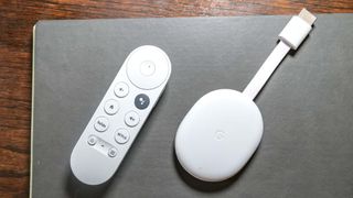 (R to L) The Chromecast with Google TV HD and remote