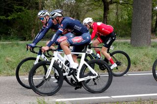 VALKENBURG NETHERLANDS APRIL 10 LR Michael Gogl of Austria and Mathieu Van Der Poel of Netherlands and Team AlpecinFenix compete during the 56th Amstel Gold Race 2022 Mens Elite a 2541km one day race from Maastricht to Valkenburg AGR2022 WorldTour on April 10 2022 in Valkenburg Netherlands Photo by Bas CzerwinskiGetty Images