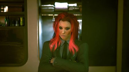 V with pink hair wearing a suit standing in front of the wardrobe in Cyberpunk 2077.