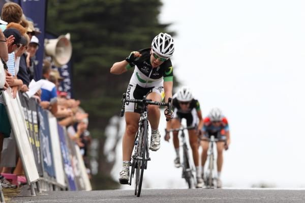 Amanda Spratt (GreenEDGE) crossed the line and celebrated her team-mate's historic victory