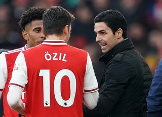 Arsenal head coach Mikel Arteta (right) spent five years at the Emirates as a player and was made captain by Arsene Wenger