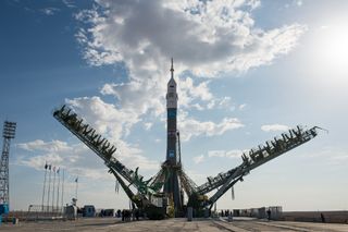 A Russian Soyuz rocket carrying the Soyuz TMA-14M spacecraft towers over its launch pad at Baikonur Cosmodrome ahead of a Sept. 26, 2014 local time launch (Sept. 25 Eastern Time).