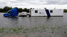 A FEMA truck sits in floodwaters on the Beltway 8 feeder road in Houston on August 30, 2017, as the fourth-largest city in the US battled with tropical storm Harvey and resulting floods. 