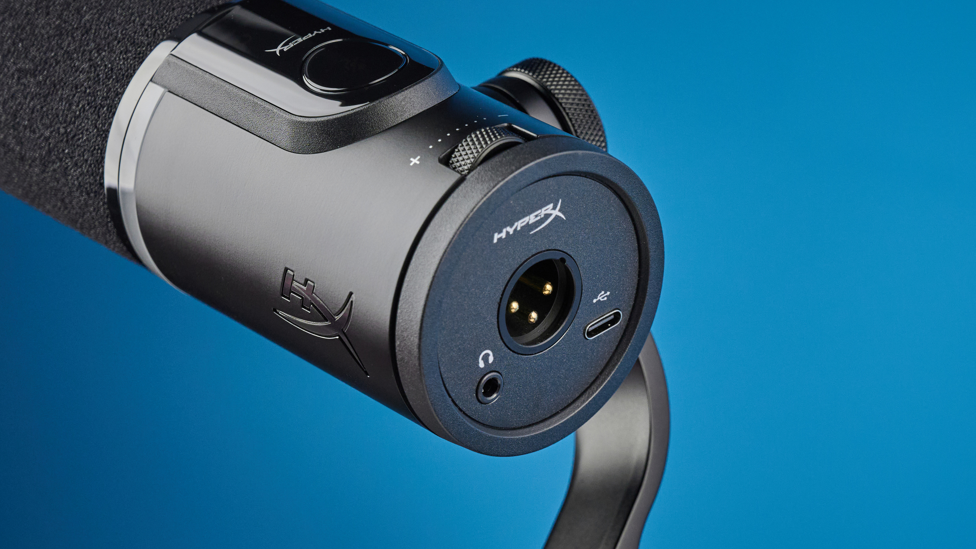 the hyperx flipcast streaming microphone on a boom arm with an RGB LED panel and an xlr and usb-c connectivity