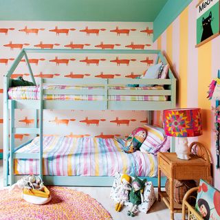 colourful kids bedroom with bunk beds and wallpaper