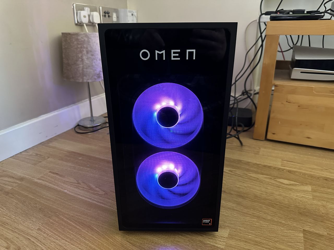 The front of the HP Omen 35L with its fans shining purple
