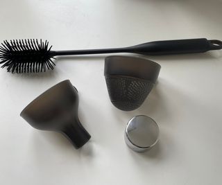 Juicer cleaning accessories: a filter, funnel, and silicone cleaning brush