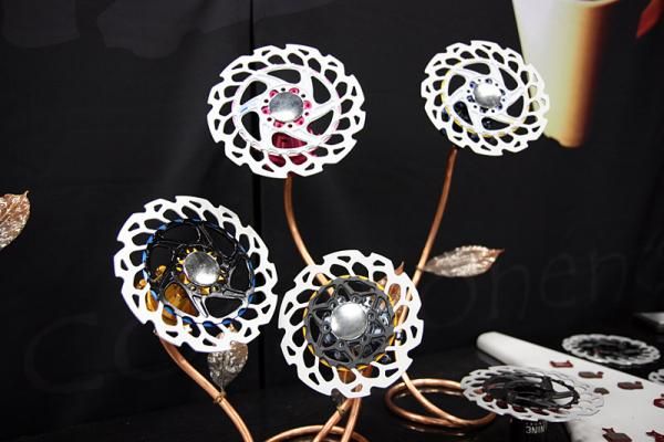 Scrub latest metal matrix rotors use aluminum center sections for those who want to go lighter but can't quite afford the company's magnesium-bodied rotors.
