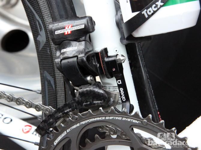 This Europcar Colnago's Campagnolo Super Record EPS front derailleur is installed with a bit of friction tape to keep it from moving. In keeping with the team's French tendencies, there's also an Aivee adjustable chain catcher - just in case
