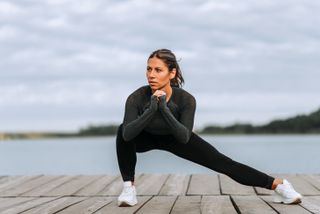 Woman doing side lunge