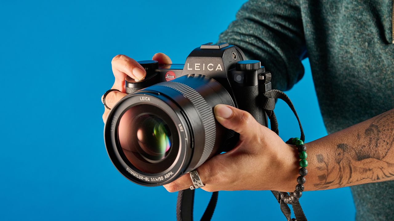 A black Leica SL3 mirrorless full frame camera