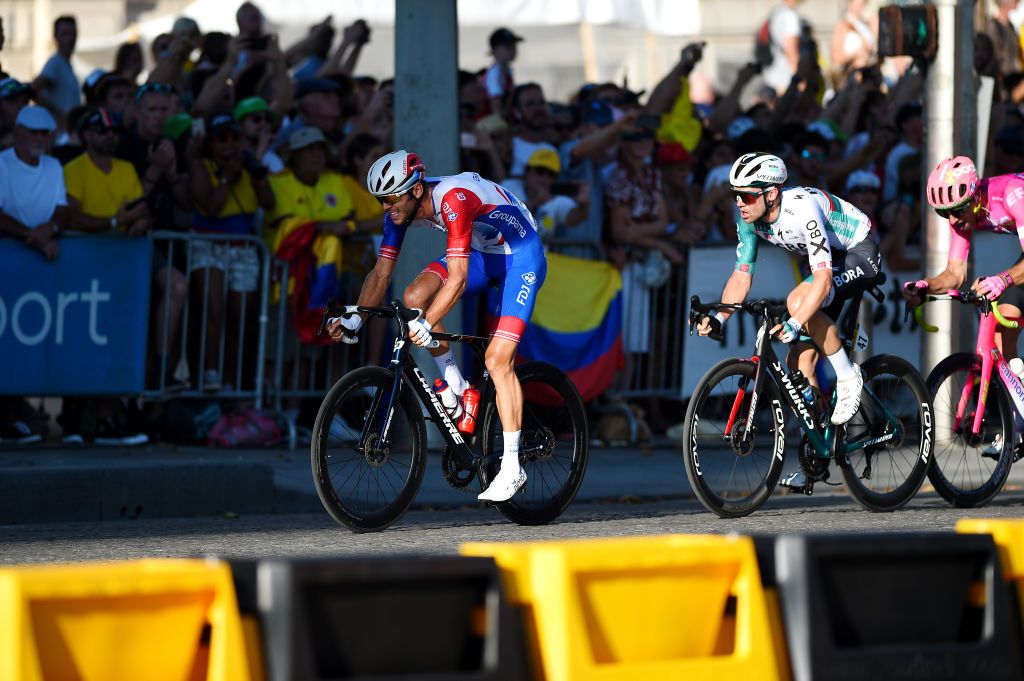 PARIS FRANCE JULY 24 LR Antoine Duchesne of Canada and Team Groupama FDJ and Maximilian Schachmann of Germany and Team Bora Hansgrohe compete during the 109th Tour de France 2022 Stage 21 a 1156km stage from Paris La Dfense to Paris Champslyses TDF2022 WorldTour on July 24 2022 in Paris France Photo by Dario BelingheriGetty Images