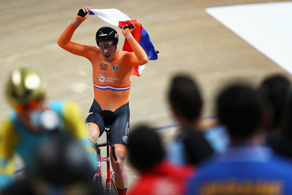 Jan-Willem van Schip of the Netherlands celebrates winning the gold medal in the Men's Points Race Final
