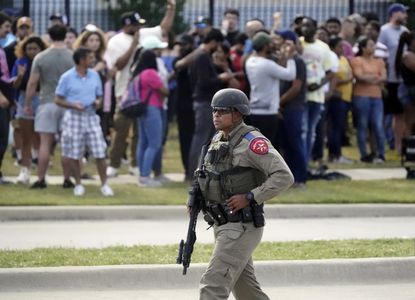 The aftermath of a mass shooting in Allen, Texas. 