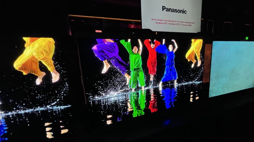 Panasonic Z95B OLED TV showing image of people in colorful clothes dancing