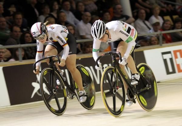 Anna Meares (Australia) and Kristina Vogel (Germany) start to wind up the sprint with two laps to go.