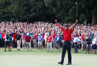Tiger Woods celebrates winning the Tour Championship