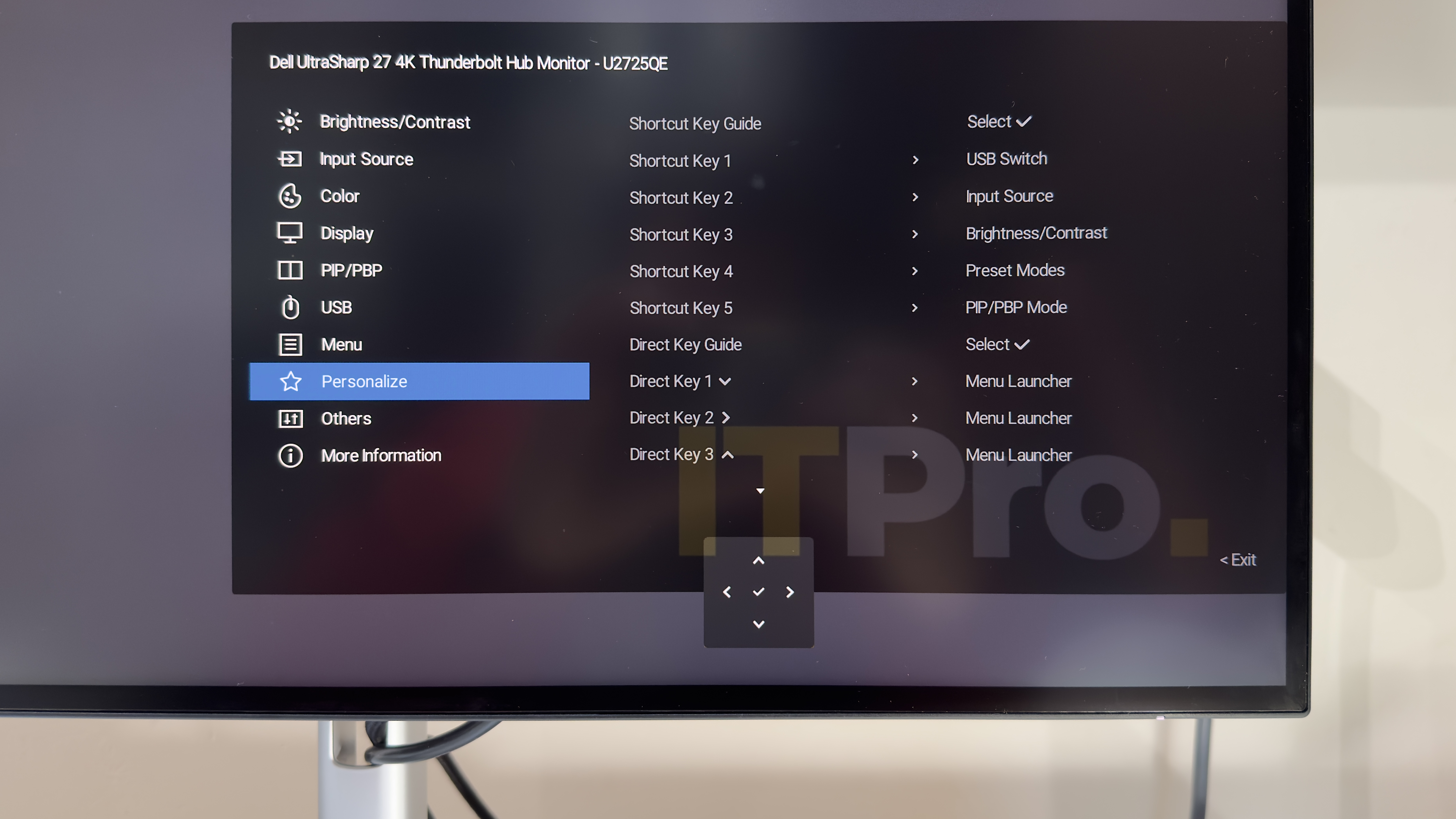 The DellUltraSharpe U2725QE monitor on a desk