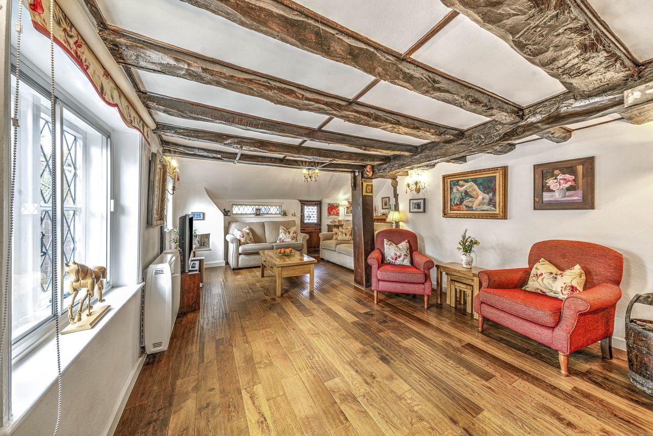 Images of the interiors and exteriors of The Thatched Cottage, Nutbourne