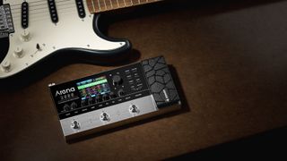 Donner's new Arena2000 multi-effects unit sits under an electric guitar