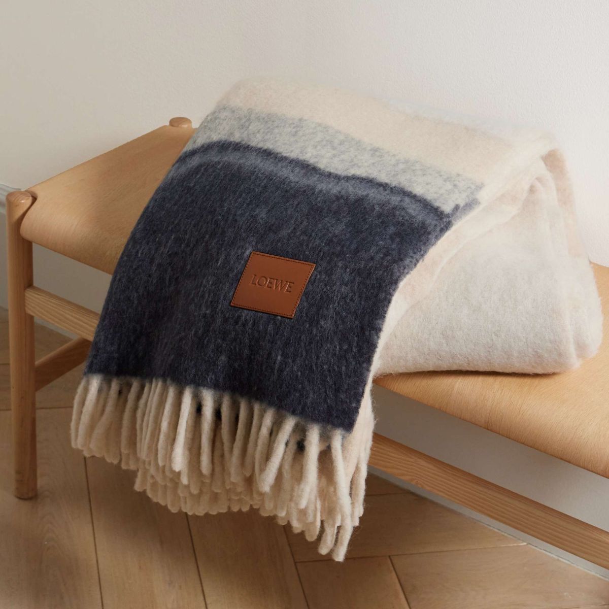 A soft blue and light brown blanket