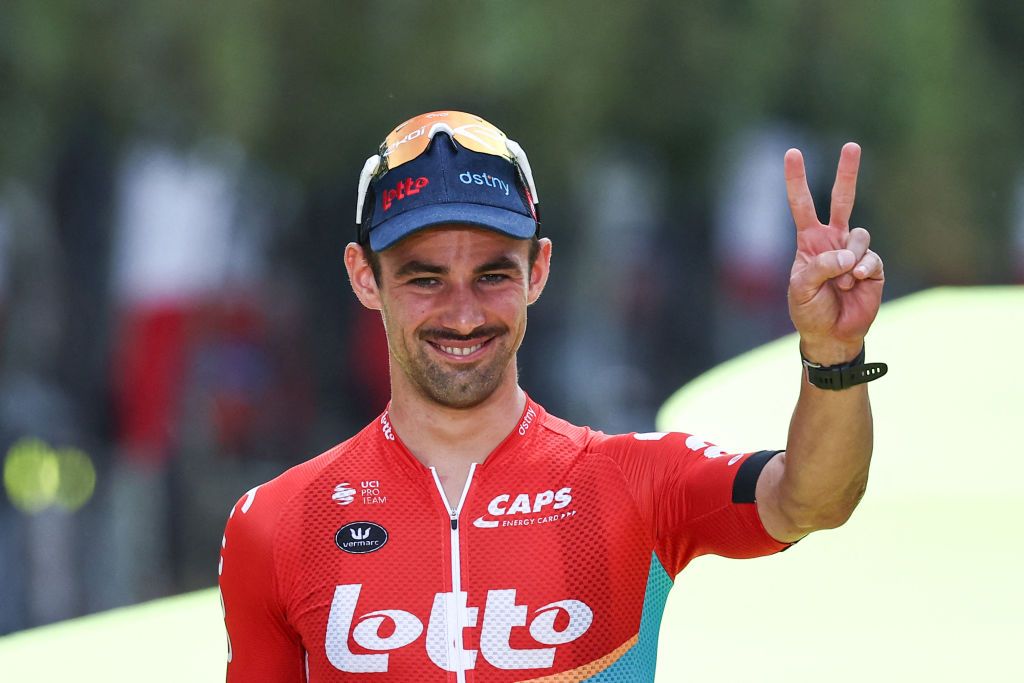 Lotto Dstnys Belgian rider Victor Campenaerts celebrates on the podium with most combative riders award after the 21st and final stage of the 110th edition of the Tour de France cycling race 115 km between SaintQuentinenYvelines and the ChampsElysees in Paris on July 23 2023 Photo by AnneChristine POUJOULAT AFP Photo by ANNECHRISTINE POUJOULATAFP via Getty Images