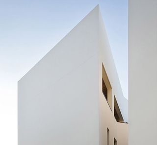 The house is clearly distinct from the street due to its contemporary shapes