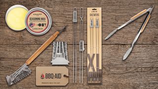 A selection of BBQ-Aid products on a wooden backdrop.