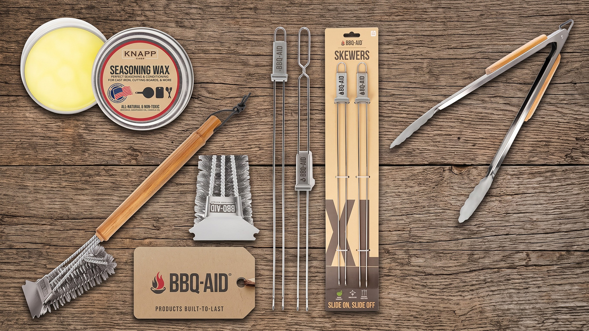 A selection of BBQ-Aid products on a wooden backdrop.