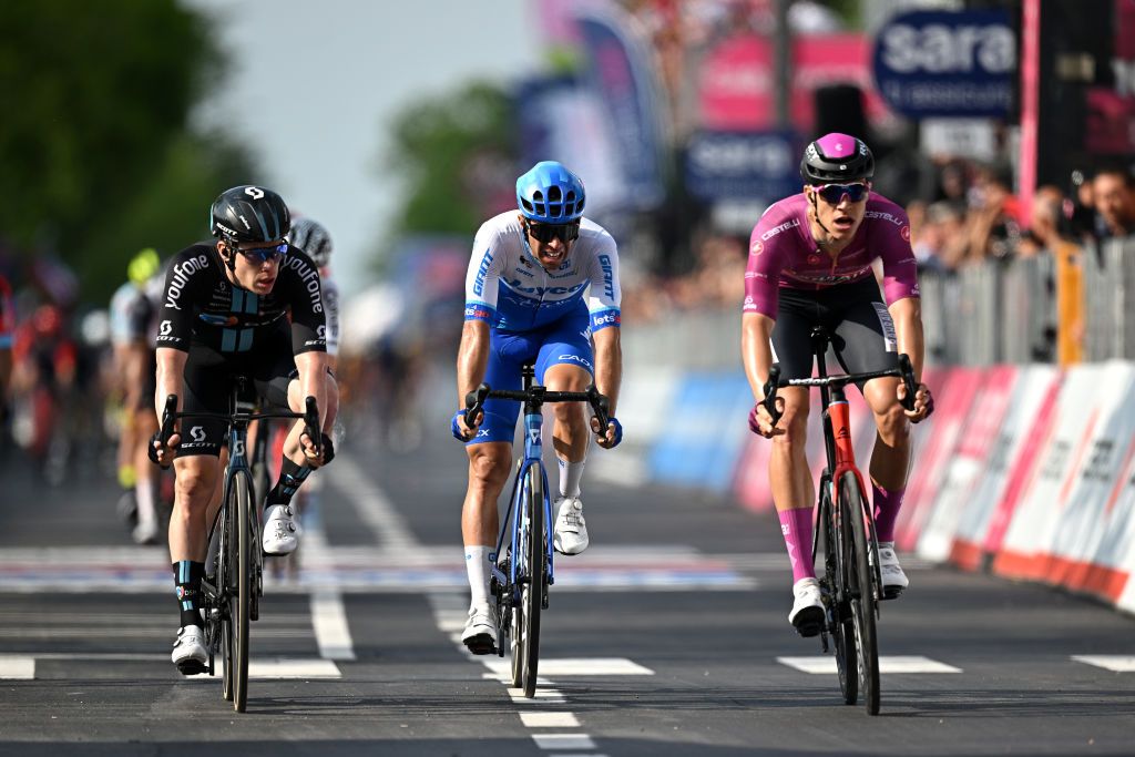 CAORLE ITALY MAY 24 LR Alberto Dainese of Italy and Team DSM Michael Matthews of Australia and Team Jayco AlUla and Jonathan Milan of Italy and Team Bahrain Victorious Purple Points Jersey sprint at finish line during the the 106th Giro dItalia 2023 Stage 17 a 197km stage from Pergine Valsugana to Caorle UCIWT on May 24 2023 in Caorle Italy Photo by Stuart FranklinGetty Images