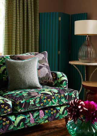 Sofa covered in Parker & Jules Strawberry field Autumn Conker velvet fabric