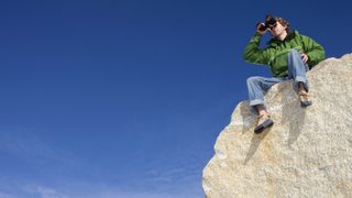 reasons you need binoculars: rock climber with bins