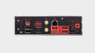 MSI MPG X570 Gaming Pro Carbon WiFi motherboard topdown view on grey background, with glowing side