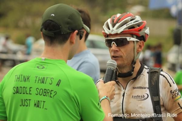 A race leader is interviewed after the finish