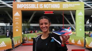 Nadia Battocletti of Italy holding Adidas Adizero Adios Pro 2 shoe she set a National Record after Women's 5km Race. World class road runners compete at the second annual adidas’ ADIZERO: Road to Records, at the brand’s HQ in Herzogenaurach on April 30, 2022