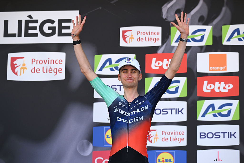 Paul Seixas of France and Team Decathlon CMA CGM celebrates on the podium of Liege - Bastogne - Liege 2026