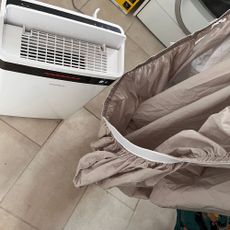 wessex 20l dehumidifier drying laundry in utility room