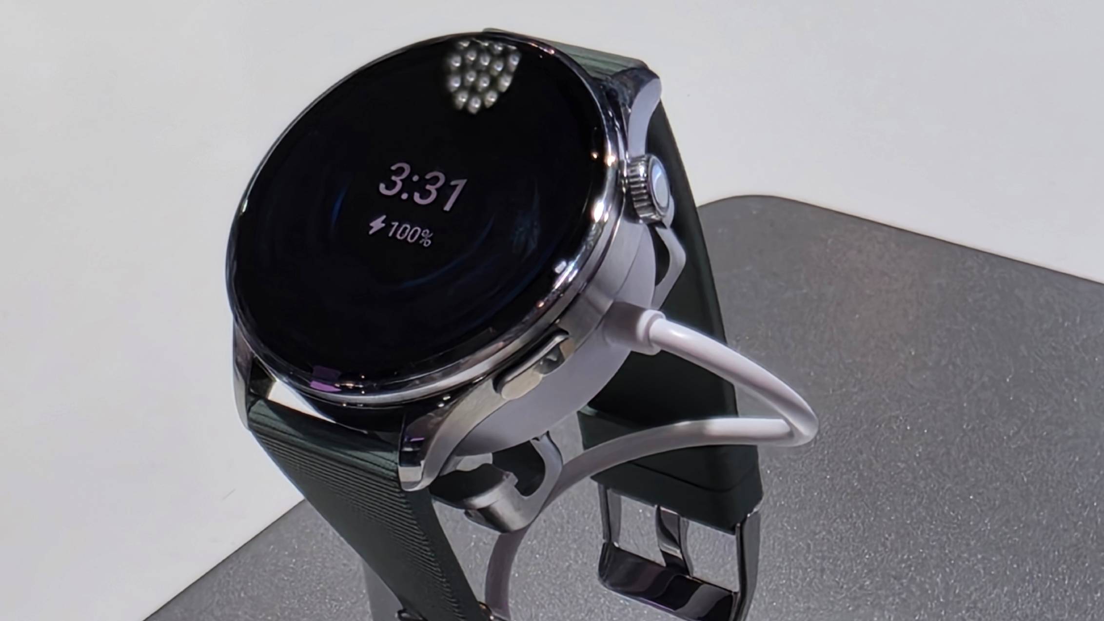 The Xiaomi Watch 5 on a stand.